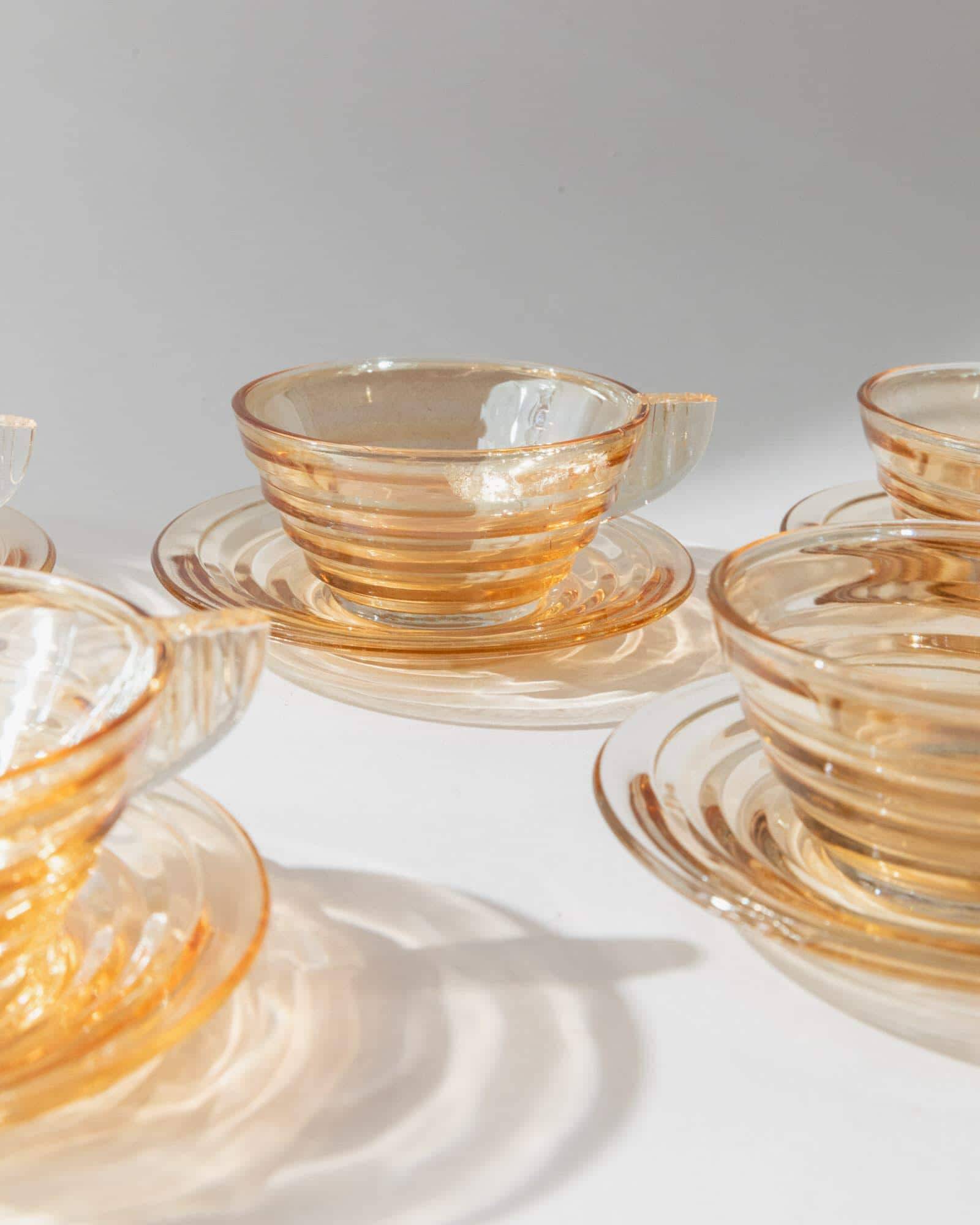 Vintage 1950s glass coffee cups, set of 5, iridescent peach ribbed glass with saucers, Italian design Gondolo.