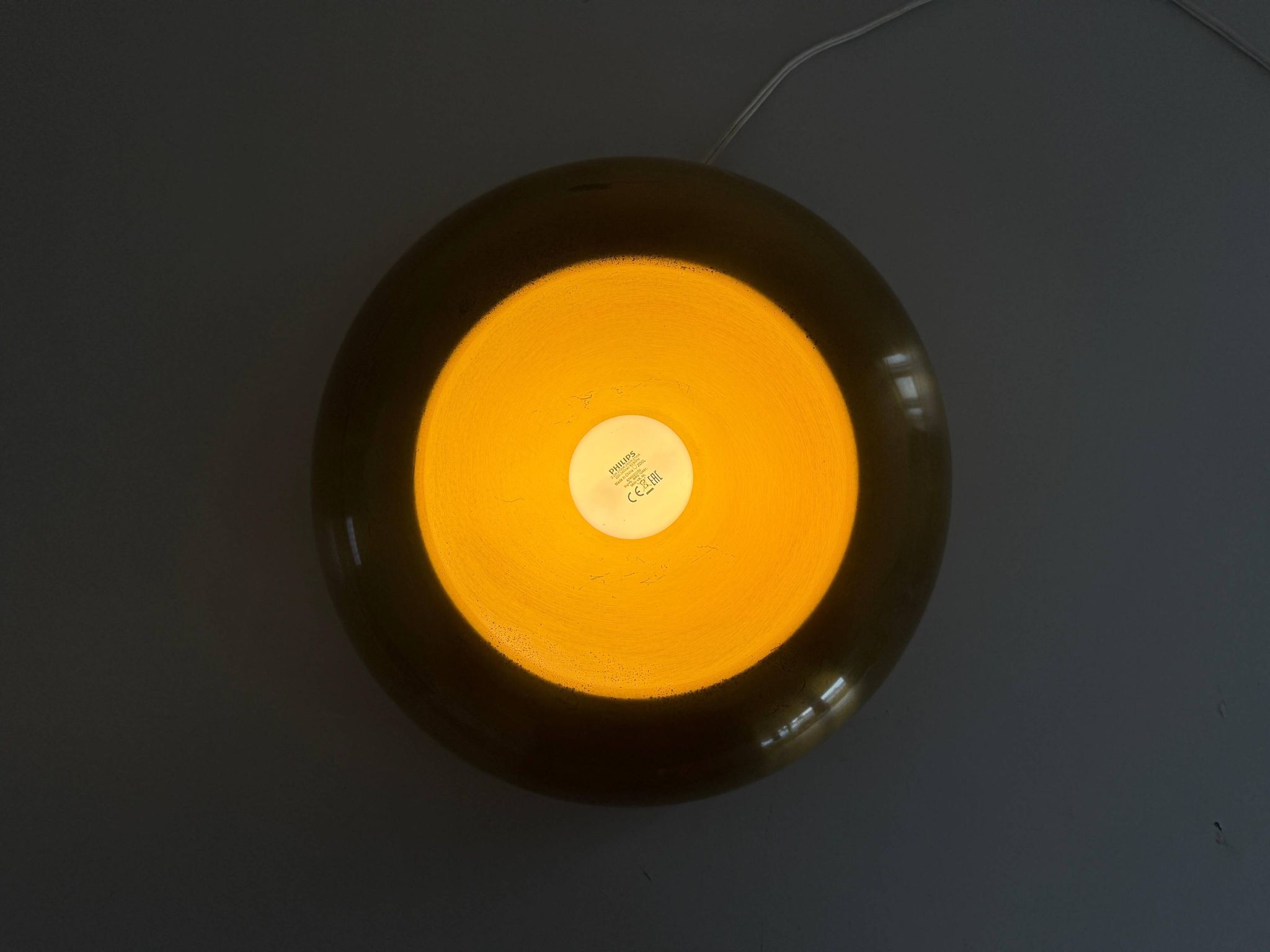 Flush-mounted disc-shaped brass fixture from the mid-century, 1960, Italy.
