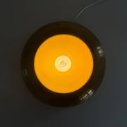 Flush-mounted disc-shaped brass fixture from the mid-century, 1960, Italy.