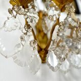 Pair of bronze wall lights and crystal pendants