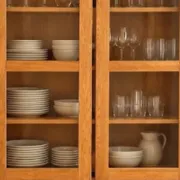 Glass display cabinet on legs