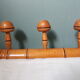 Bamboo-like wall coat rack with 5 mushroom hooks