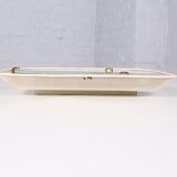 Luminous mirror in perforated sheet metal and brass