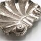 Art Deco ashtray in the shape of a shell in silver-plated metal.