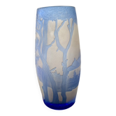 Transparent vase with a blue pattern featuring trees, signed MICHNA.