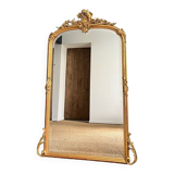 Antique mirror with pediments 141cm/80cm gilded with gold leaf, beveled ice