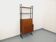 Vintage modular secretary bookshelf in teak and metal.