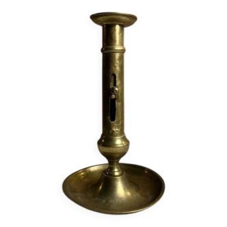 Gold-plated brass candlestick with push button