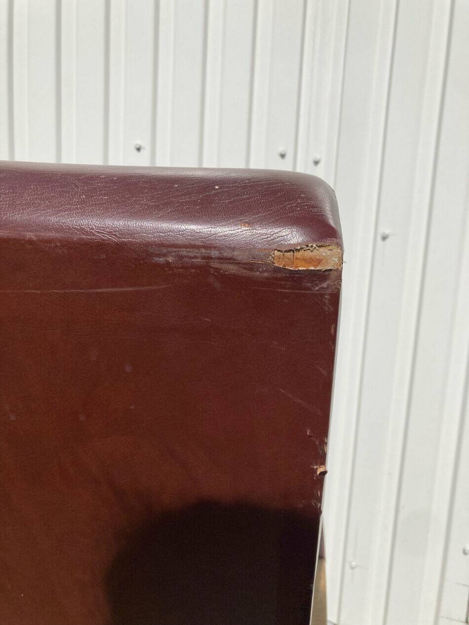 Three-seater patinated leather sofa, mid-century style.