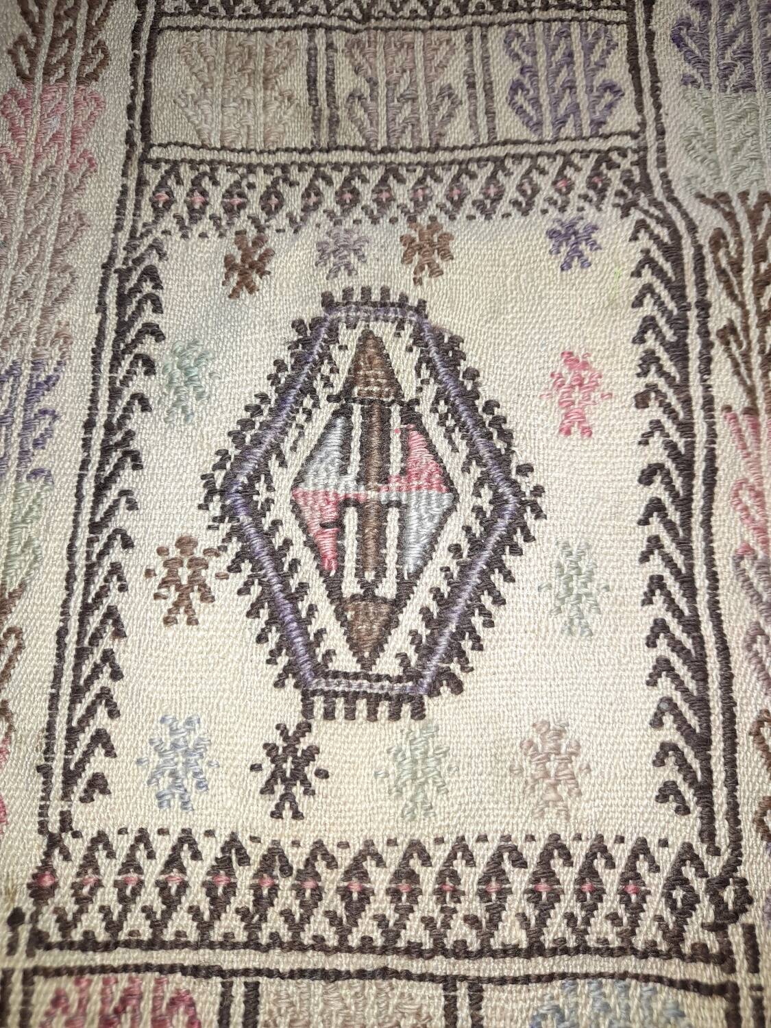 Antique embroidered kilim with 16 medallions from Turkey or the Balkans, c. 1950.