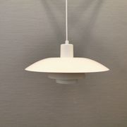 Older ph 4/3 hanging lamp, in white, with original orange suspension disk.