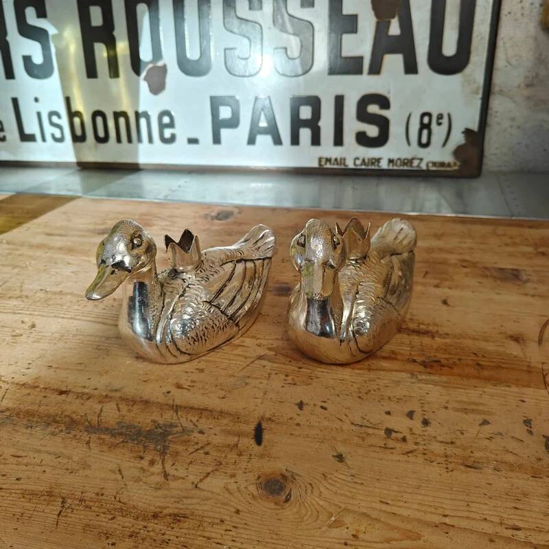 Set of two antique silver-plated candlesticks.