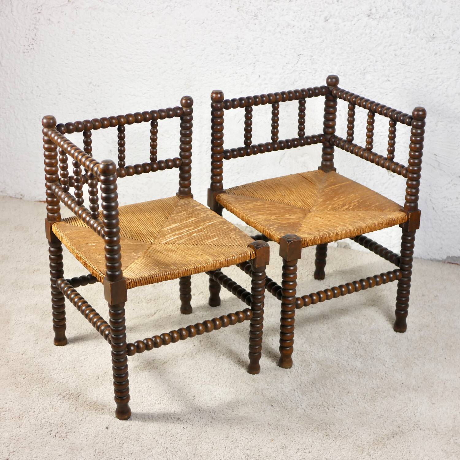 Pair of corner spool chairs