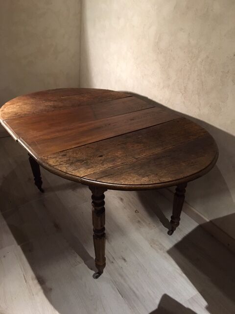 Round table old solid oak wheels 2 extensions folding sides