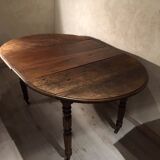 Round table old solid oak wheels 2 extensions folding sides