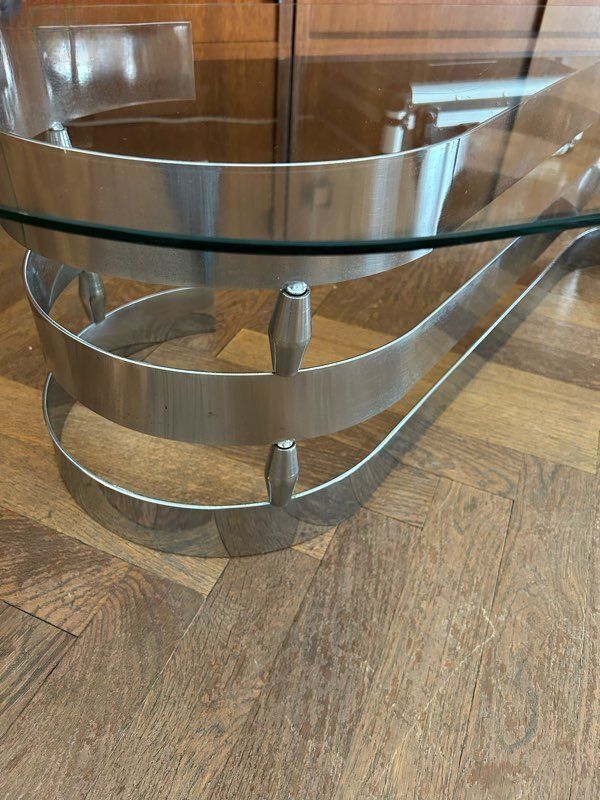 70s oval design coffee table in glass with chrome S legs.