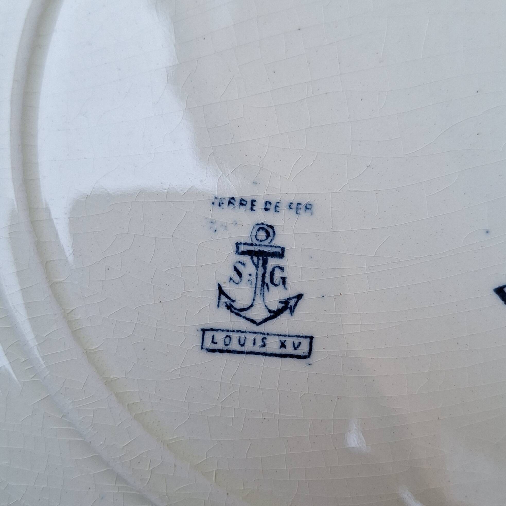 Service set in SG porcelain, Louis XV model.