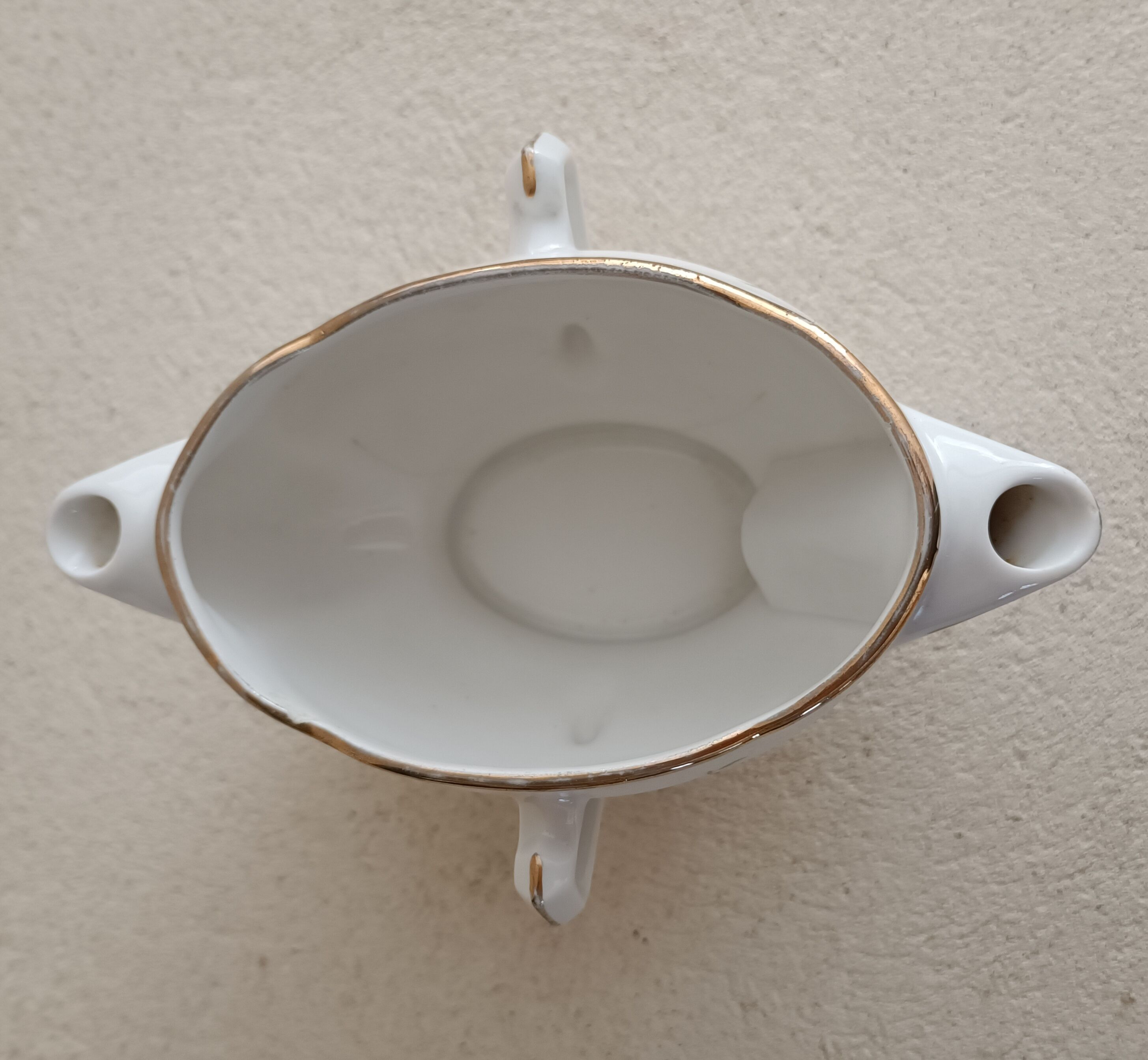Lean fat sausage in Limoges porcelain