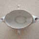 Lean fat sausage in Limoges porcelain