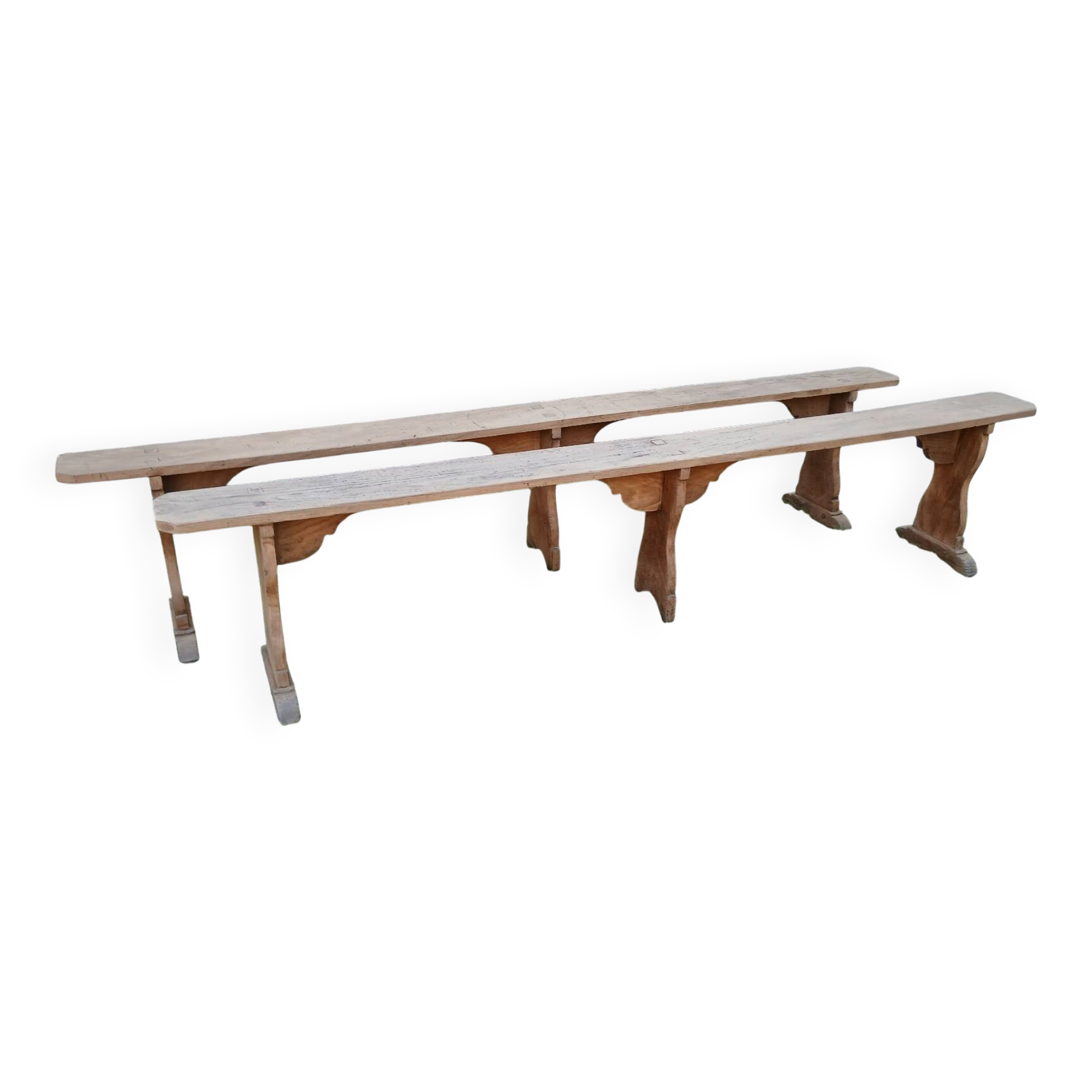 Pairs of large benches in raw fir wood.