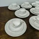 Set of 9 Villeroy and Boch Cortina mugs.
