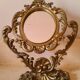 Baroque oval mirror pivoting on foot Golden brass 20x15cm