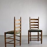 Rustic ladder-back oak chairs with embroidered seats | Netherlands | 1950s