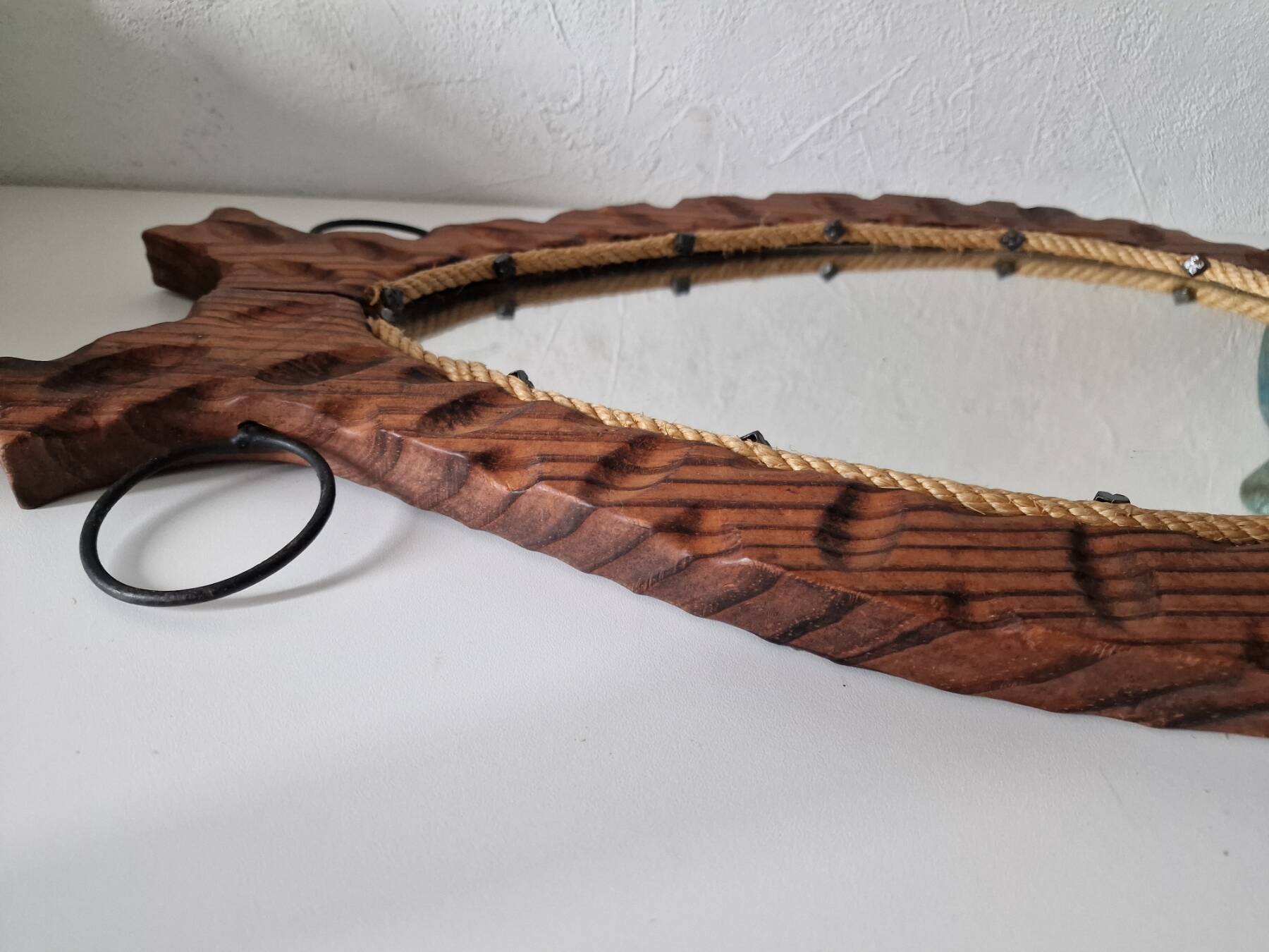 Brutalist mirror in wood and rope, free form.