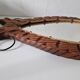 Brutalist mirror in wood and rope, free form.