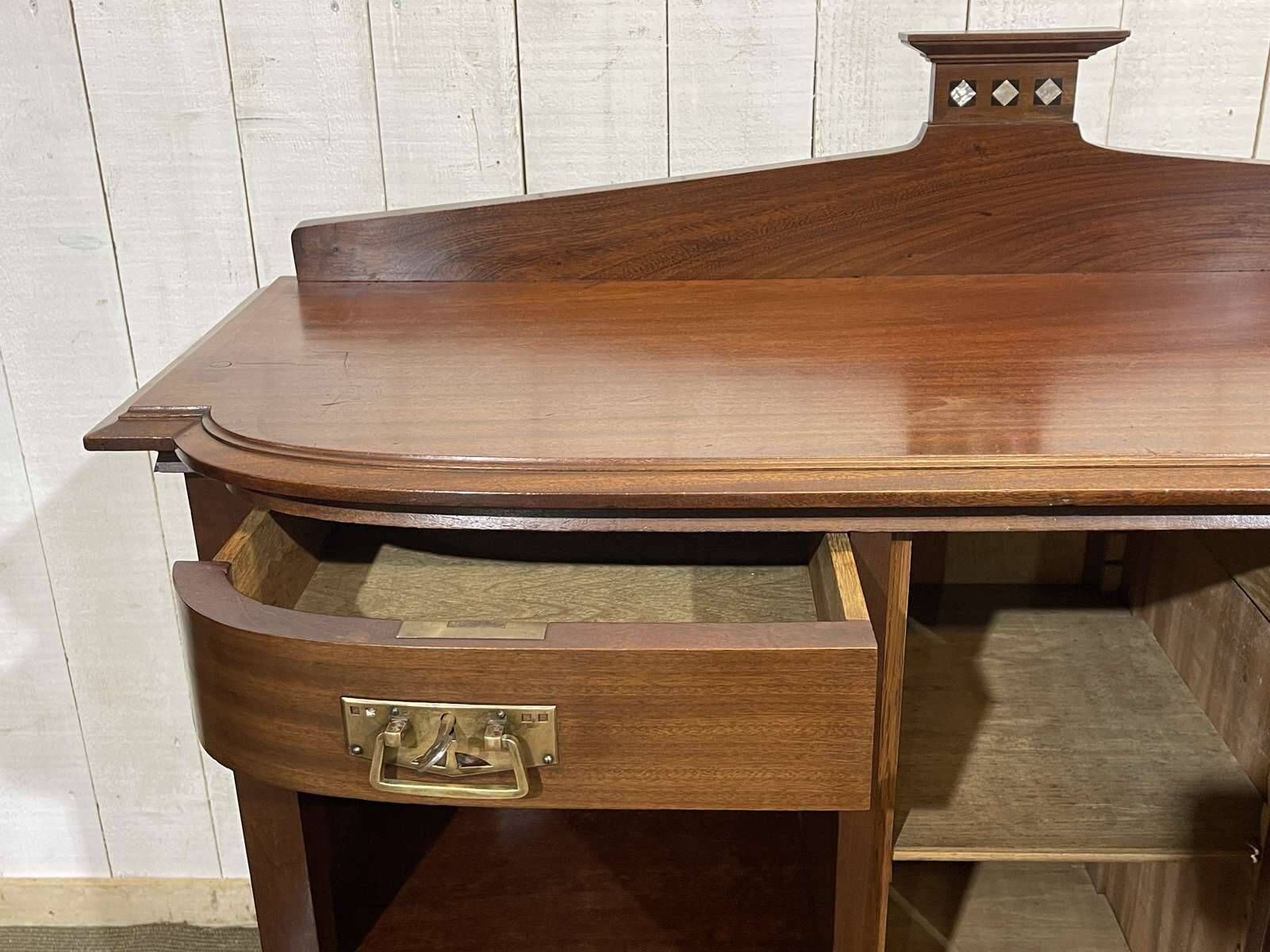 Mahogany sideboard from the Art Nouveau period in the style of Gustave Serrurier-Bovy.