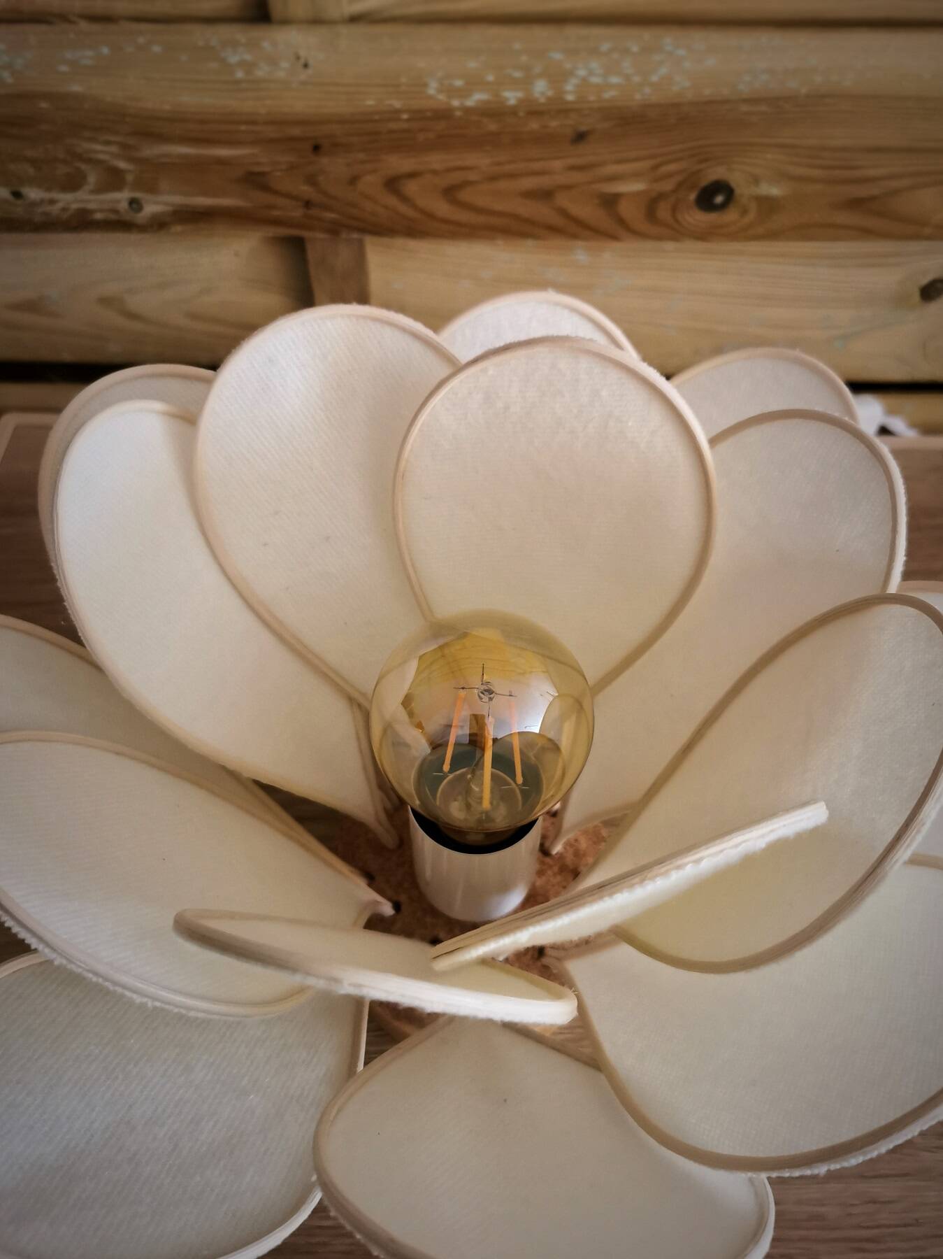 Flower table lamp made of rattan and ivory flannel petals