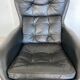 Vintage Danish swivel chair in black leather by Bramin