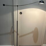 Massive pendulum floor lamp