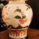 Spanish porcelain lamp hand-painted with floral patterns.