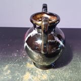 Old vase with coves ceramic black