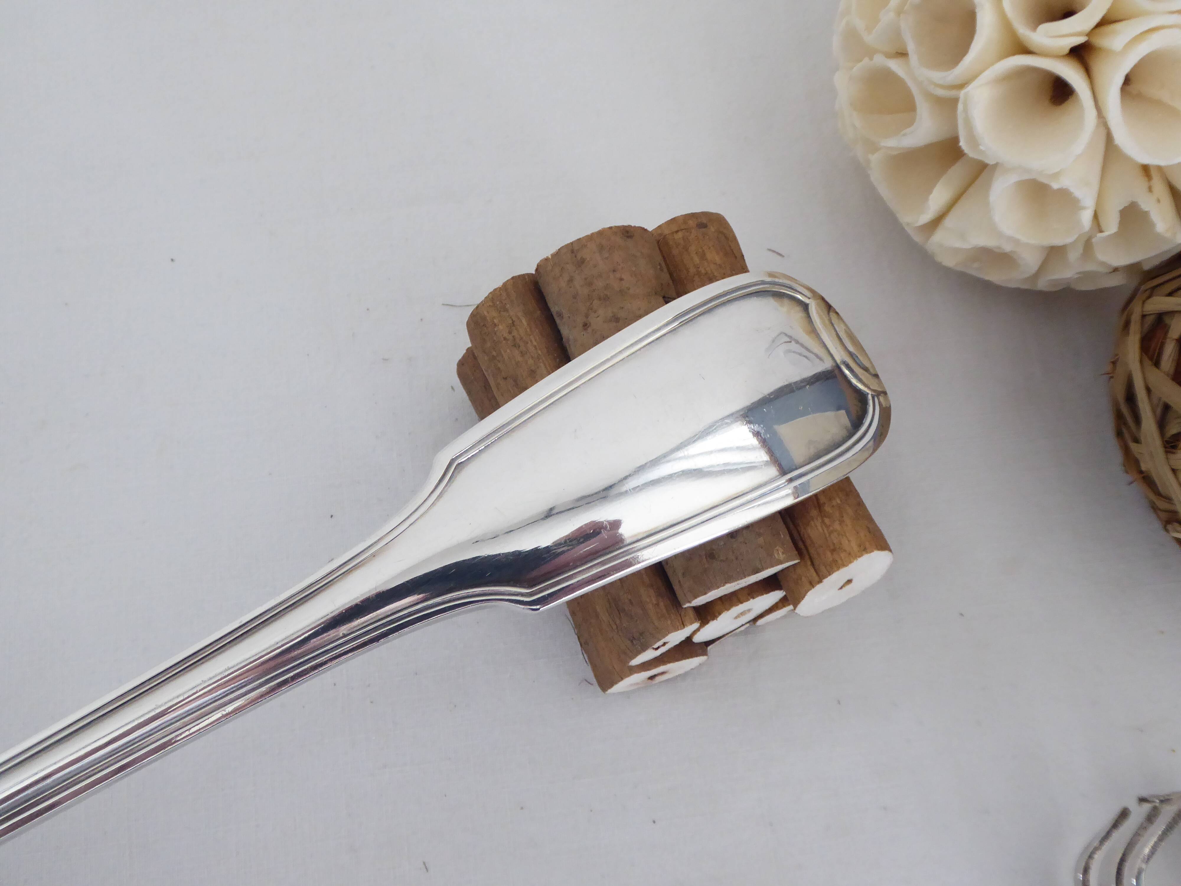 Silver metal ladle