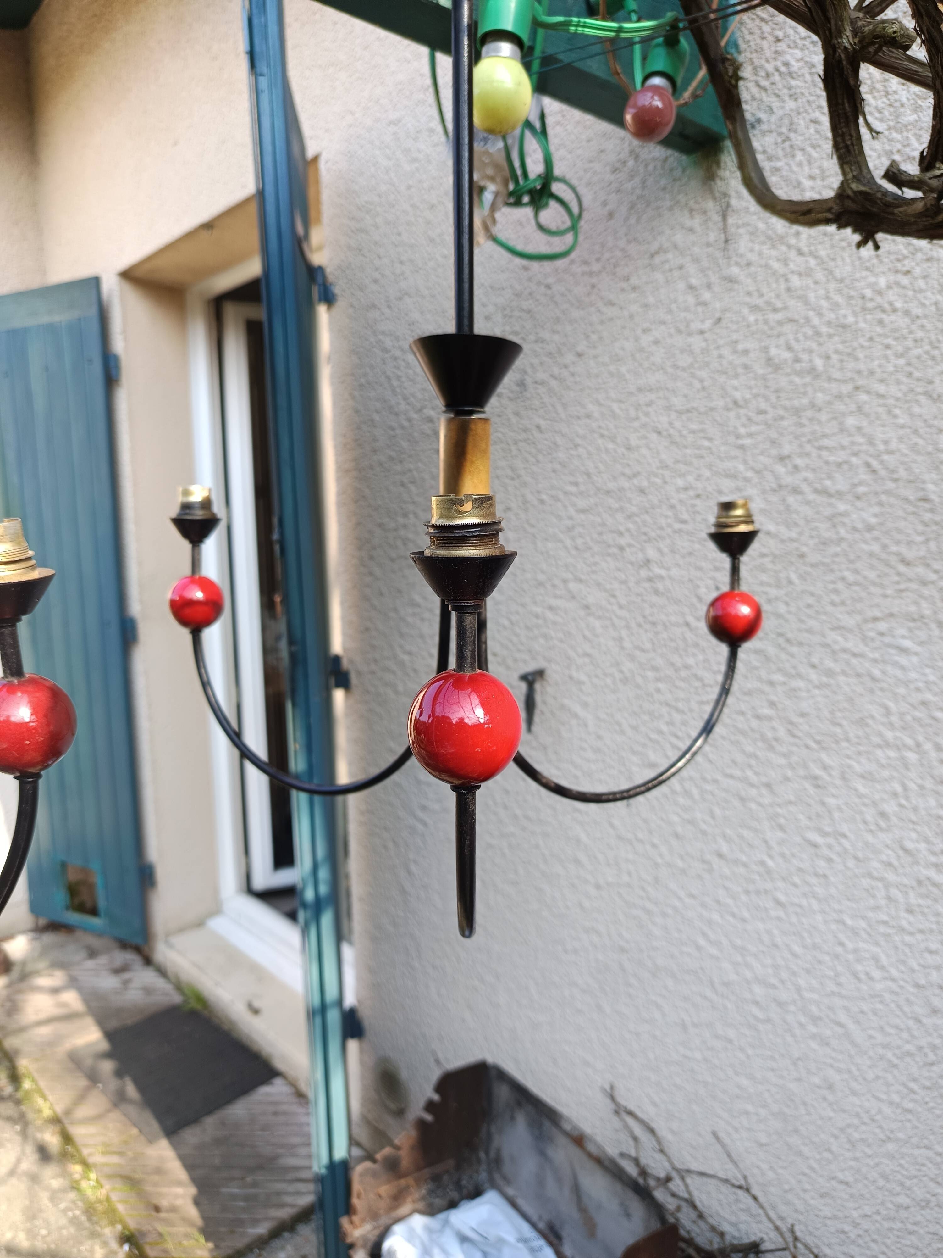 pair of vintage black metal chandeliers with red balls 1950/1970