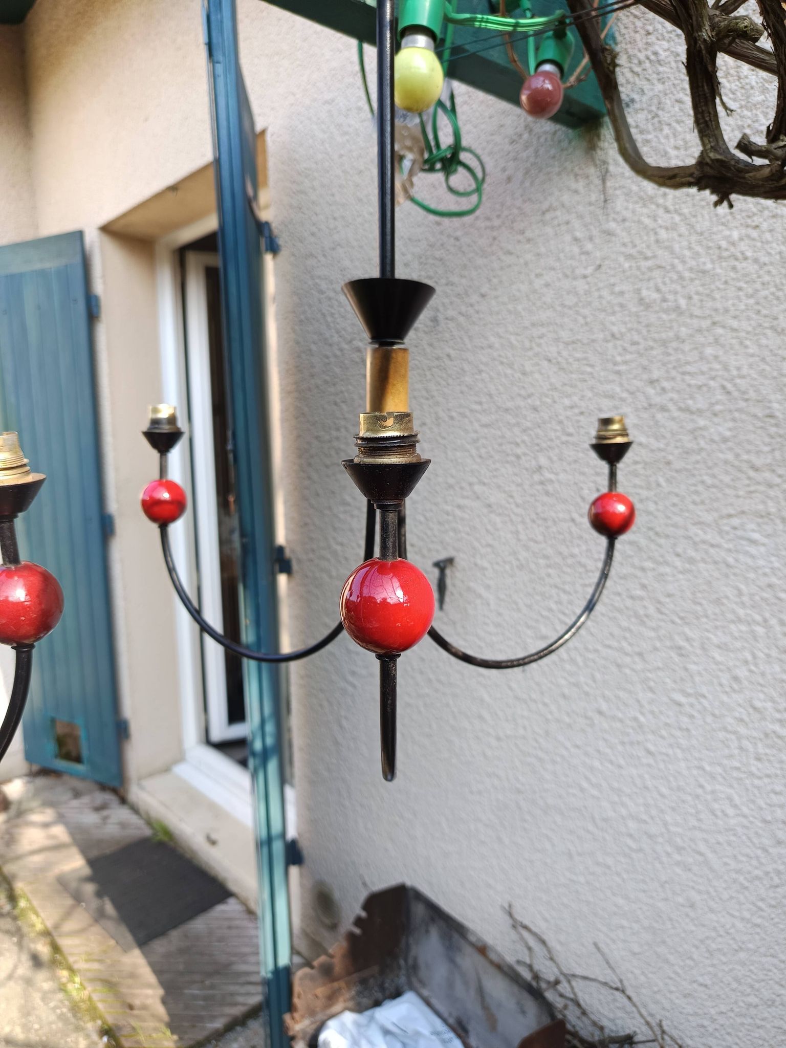 pair of vintage black metal chandeliers with red balls 1950/1970