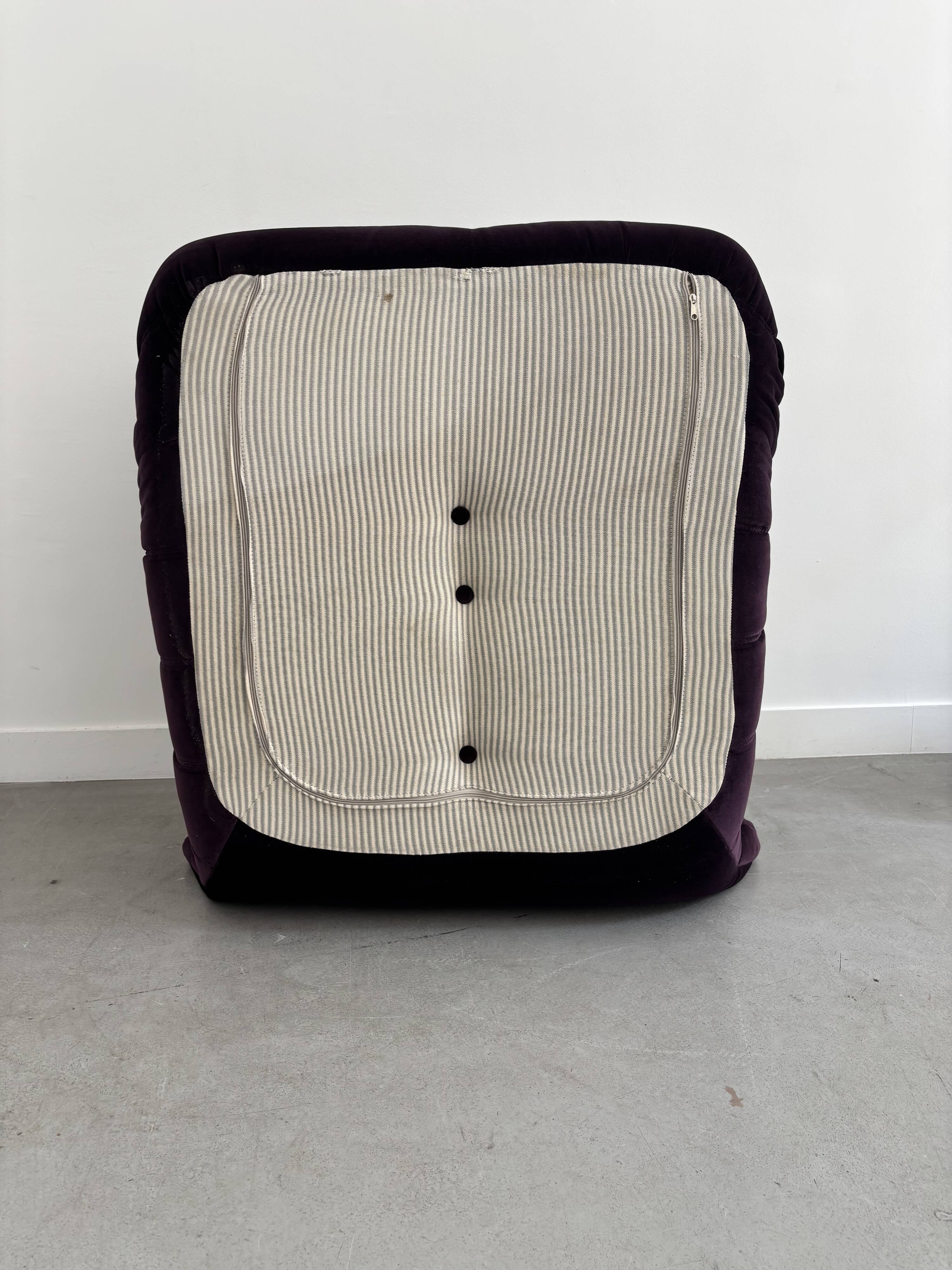 Purple "Togo" armchair by Michel Ducaroy