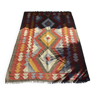 Multicoloured handmade wool kilim rug. Turkey, 1970s.