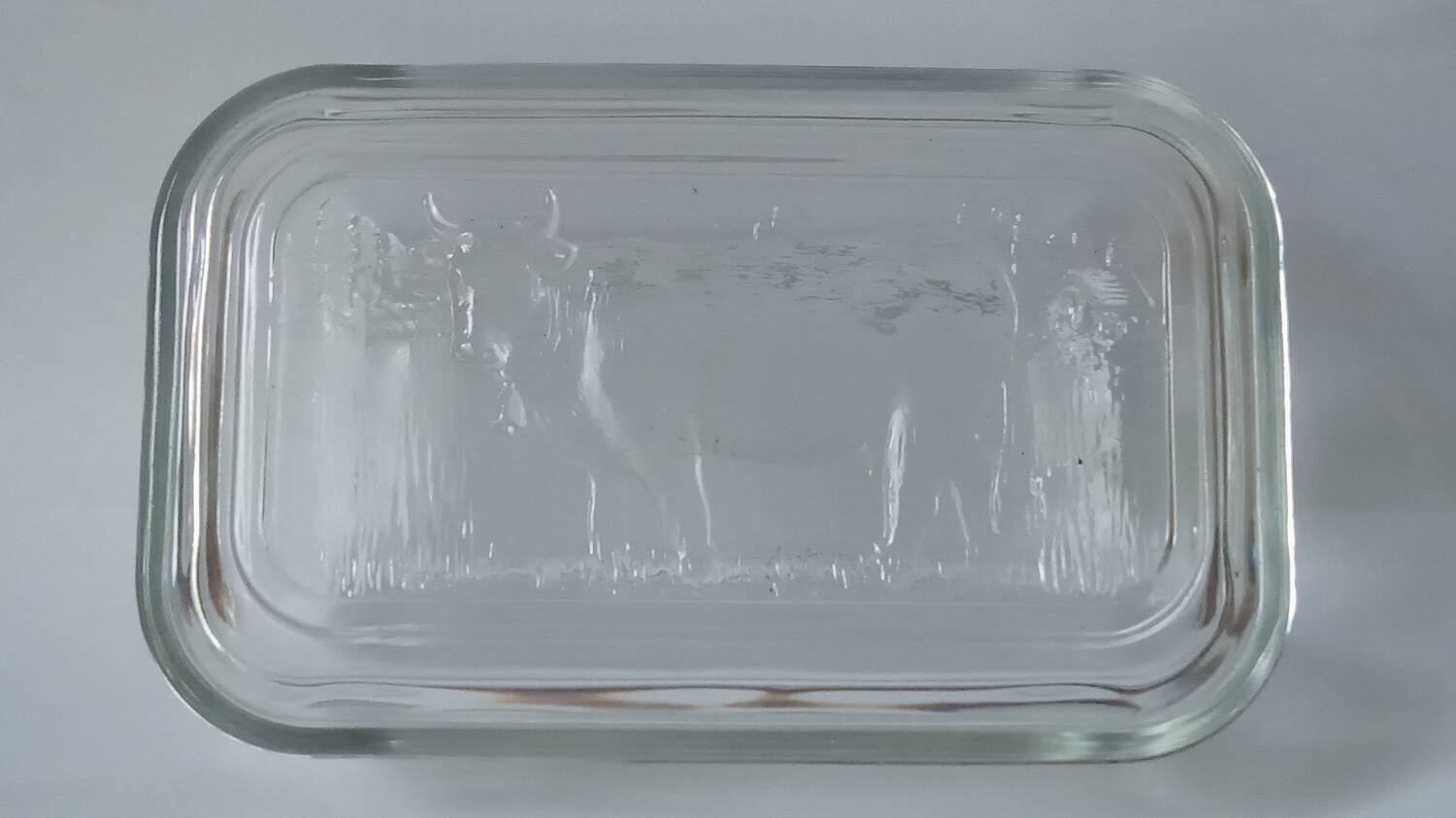 Glass butter dish with cow decor
