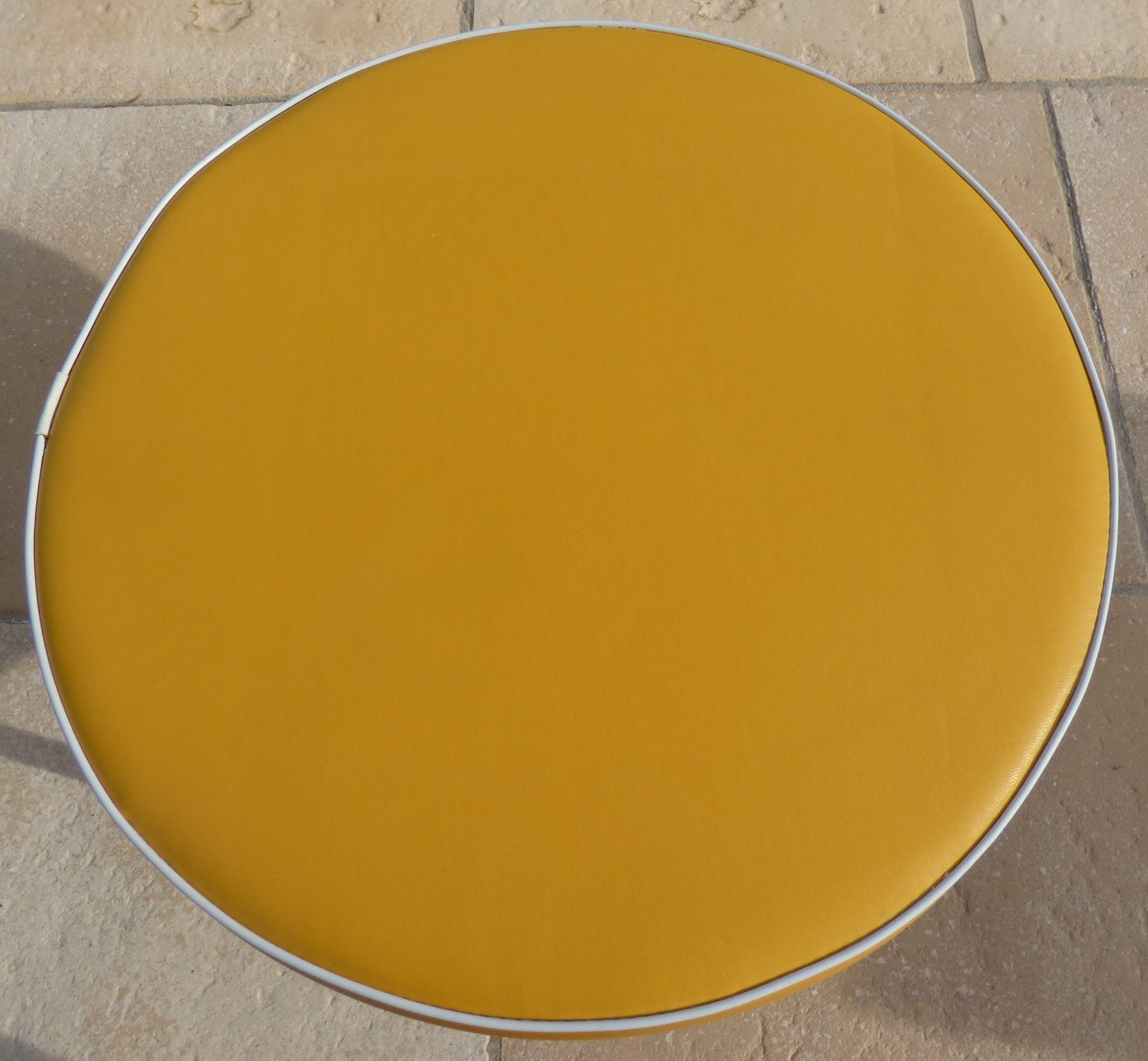 1 vintage round stool in yellow imitation leather