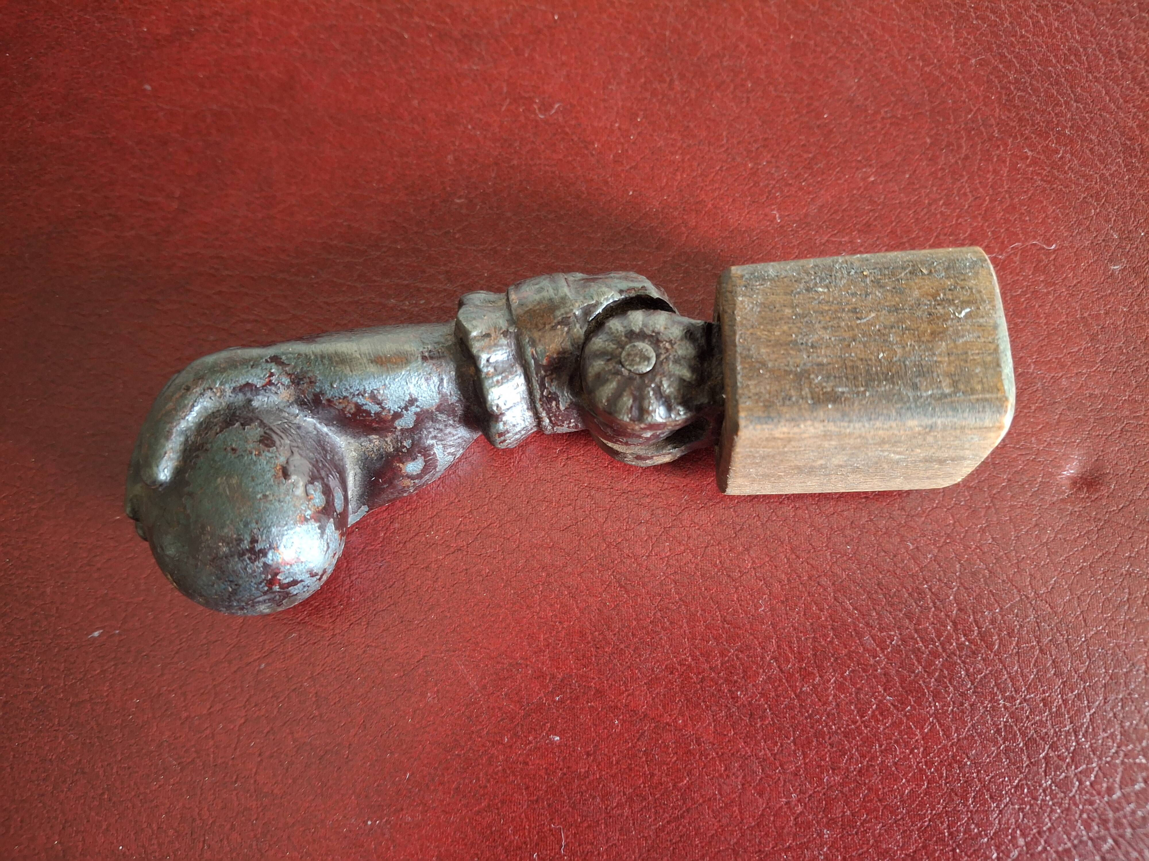 Cast iron door knocker from the 19th century or earlier.
