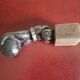 Cast iron door knocker from the 19th century or earlier.