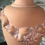 Terracotta lamp decorated with fruit crown