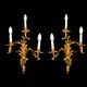 Pair of gilded bronze wall sconces in Rococo style, three lights.