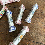 Set of 8 knife holders in painted earthenware