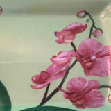 Cake dish with fuchsia orchids