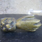 Hand-shaped door knocker