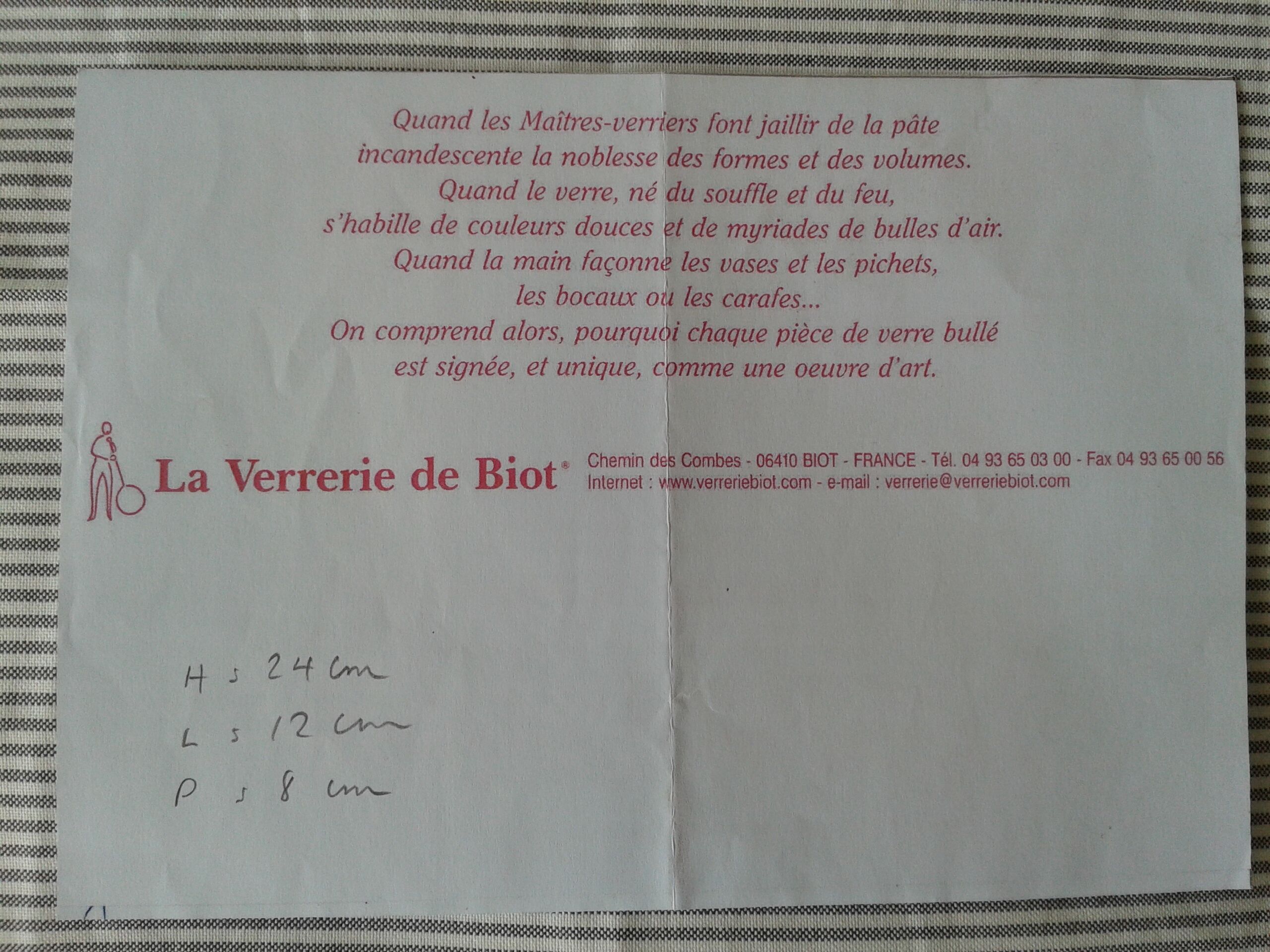 A bolted glass carafe